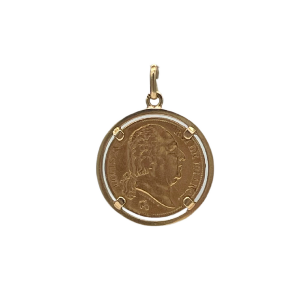 21.6k gold 1824 20 French Francs Louis XVIII coin pendant in a 18k yellow gold frame. King of France commemorative coin in smooth setting. Louis XVIII was the last French monarch to reign until his death in 1824.