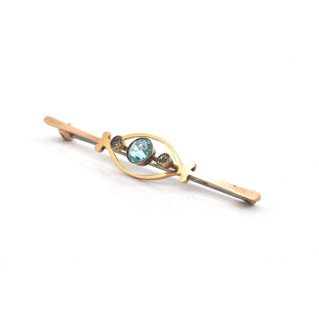 1.2CT Blue and 0.22CT White Zircon 9K Yellow Gold Brooch C.1920 + Montreal Estate Jewelers